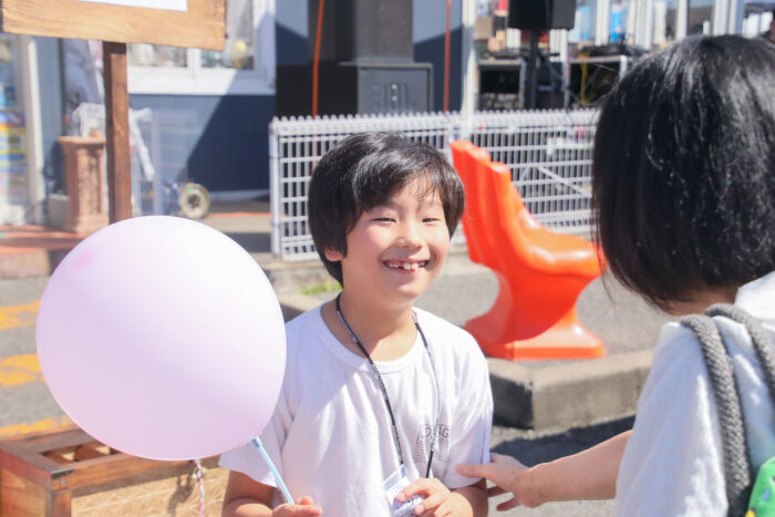 a boy smiling happily