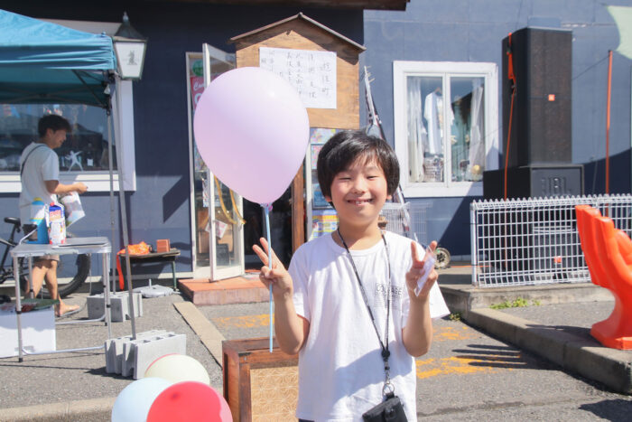 a boy smiling happily